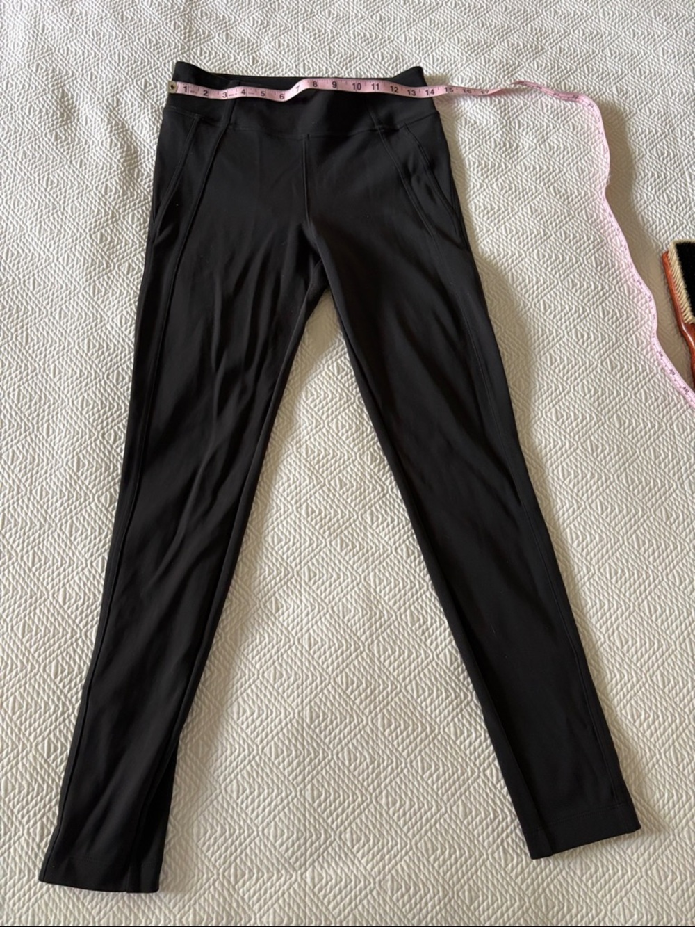 Athleta Black High-Rise Leggings with Zip Ankles and Back Welt Pockets